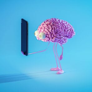 Pink brain looking at smartphone screen
