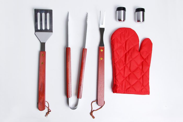 red Grill Tool flat lay